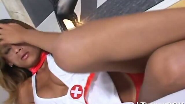 Cock gobbling shemale nurse slut
