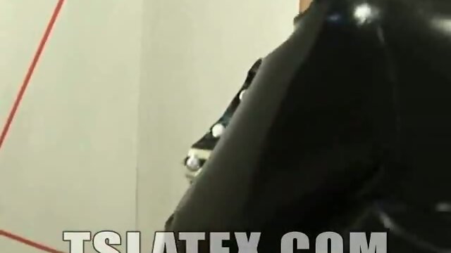 TS in latex nails him