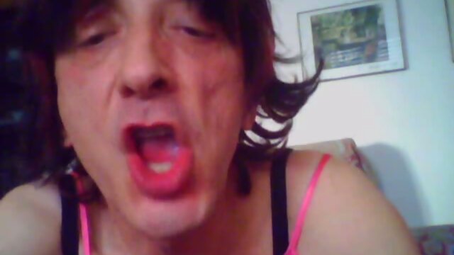 Crossdresser masturbates on webcam