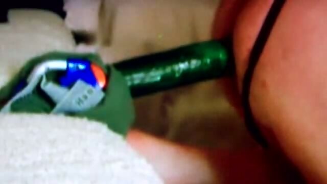 Tranny takes cucumber in ass