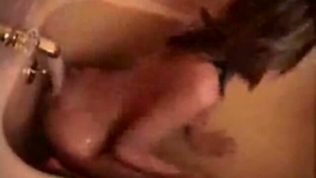 Solo slim shemale takes a bath