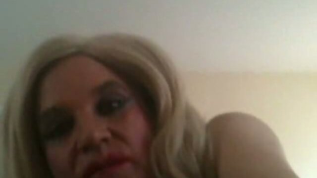 Kinky crossdresser toys his ass