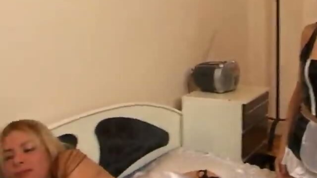 Tranny in leather boots fucked