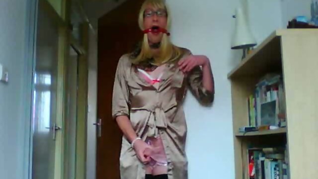 Sissy in satin and gag