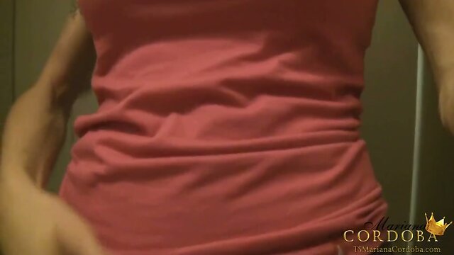 Mariana Cordoba in a public restroom