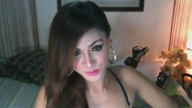 Pretty Shemale Strokes her Big Cock