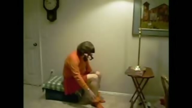 Mature sissy fucks a toy