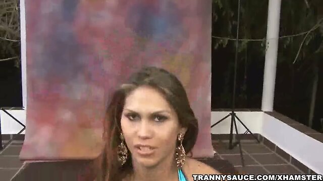 Foxy latina shemale hottie taking her clothes off