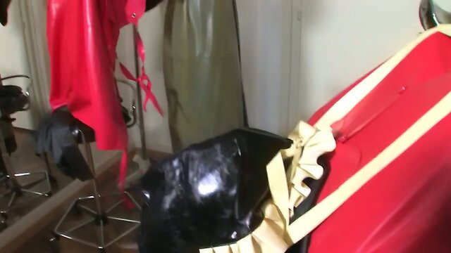 Bizarre rubber apron bondage 4 of 5