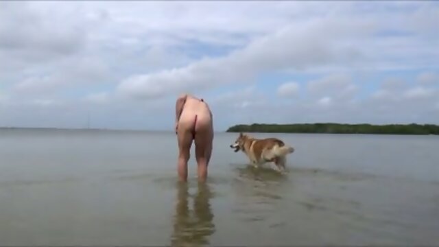 sissy slut  in the beach with C string and rosebud