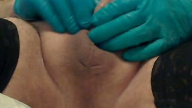 Cum in the condom with rubber gloves