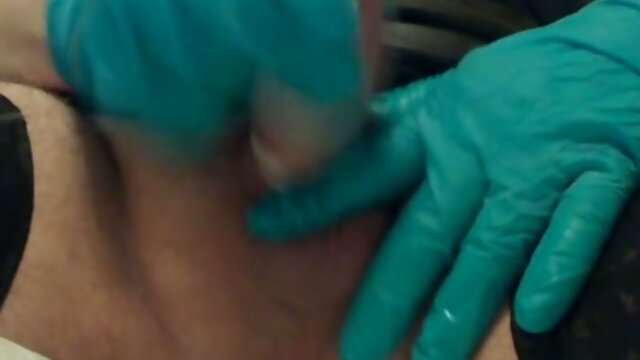 Cum in the condom with rubber gloves
