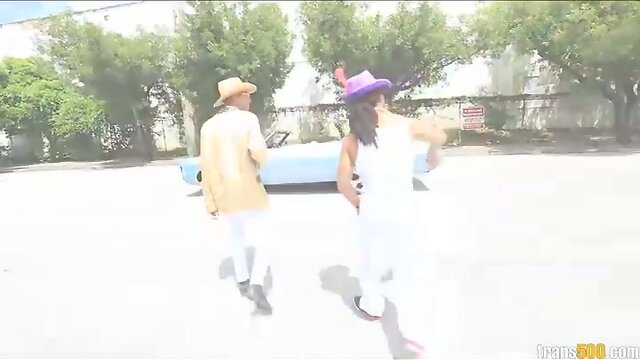 Hot cocky Asian shemale takes two huge cocks