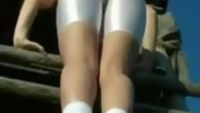climbing  in  white spandex