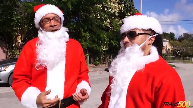 TGirl Kylie Maria suck and fuck two ebony Santas