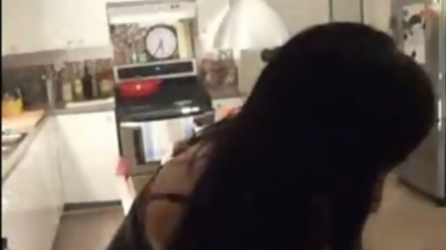 Sultry Crossdresser Sucks Deeply on a Lollipop