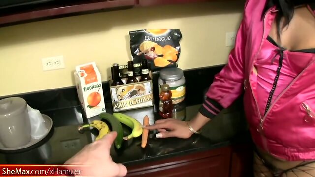 Ebony t-babe with puffy nipples toys ass hole with cucumber