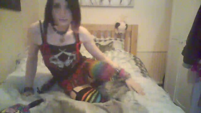 Furry Emo Femboi playing with her toys