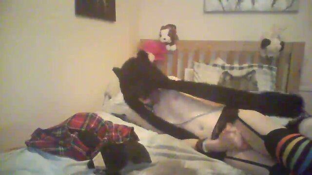 Furry Emo Femboi playing with her toys