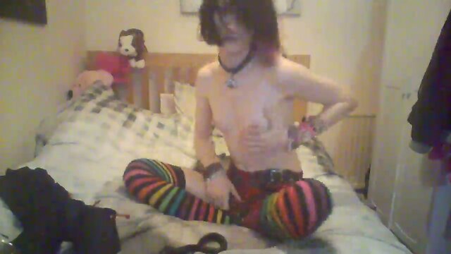 Furry Emo Femboi playing with her toys