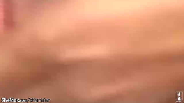 Ebony shemale shakes big ass and covers shecock with lotion