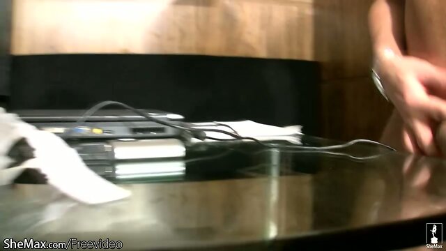 Busty shemale is showing massive ass and works on her cock