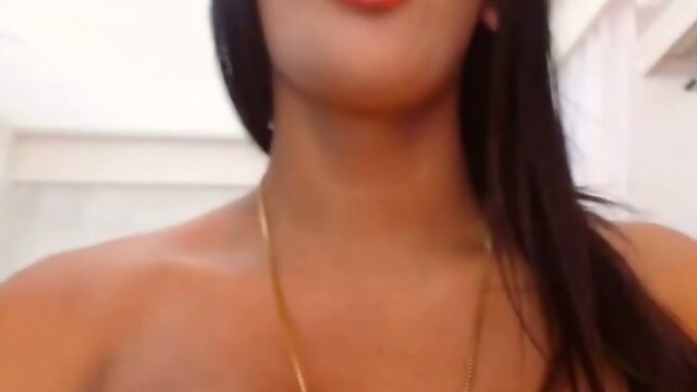 Two busty colombian shemales jacking off