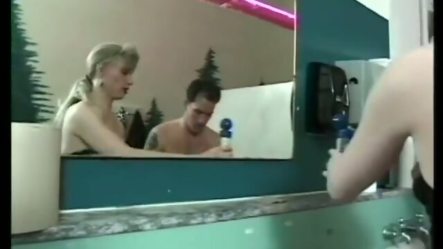 Brandy Scott fucks a guy in the bathroom.