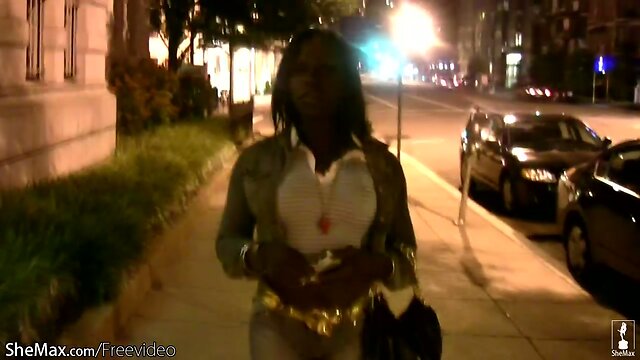 Ebony shemale exposes her uncut black shecock and big boobs