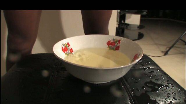 hot LadyBoy peeing in a plate