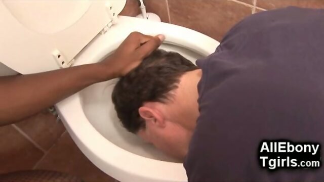 Ebony Trans Domme Punishes The Old Plumber!