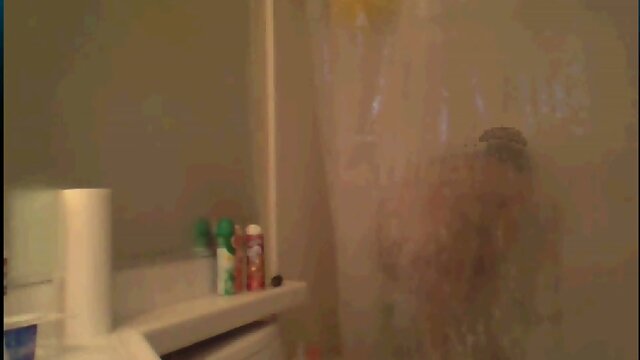 Tranny taking a shower and masturbate hard