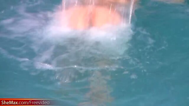 Big ass tranny plays with her massive penis in pool and cums