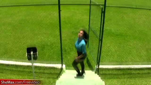 Busty Latina TS exposes big breasts and butt on soccer field