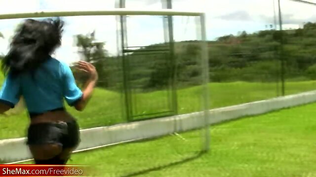 Busty Latina TS exposes big breasts and butt on soccer field