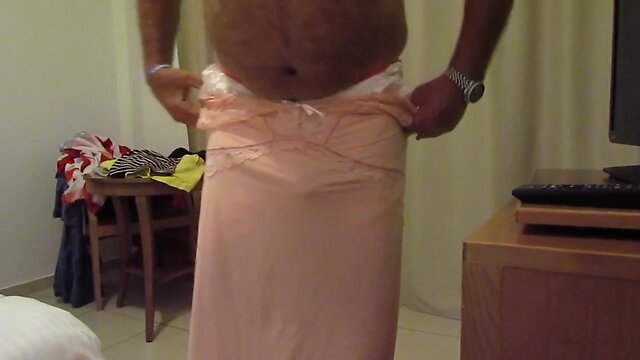 My M&S pink nylon slip and wife wanking me off