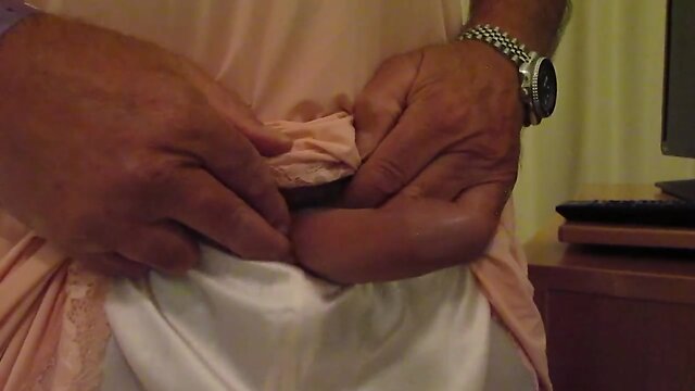 My M&S pink nylon slip and wife wanking me off
