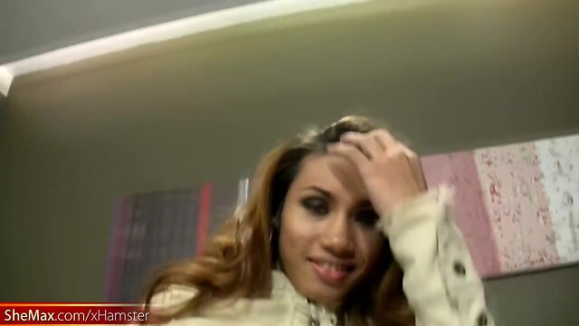 Rafe gets his huge cock sucked by sexy redhead Thai ladyboy