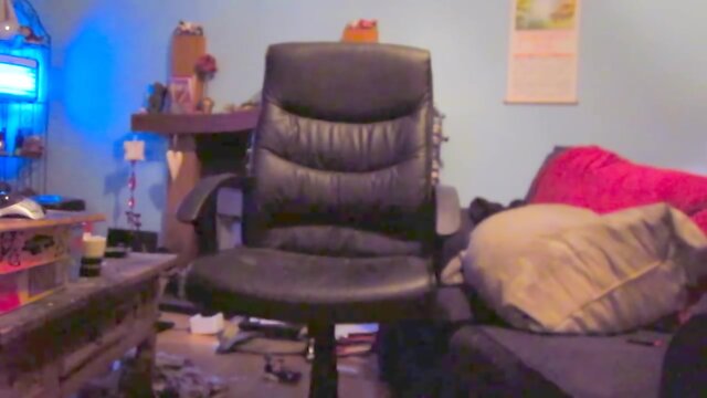 Wearing a white mini skirt suit, stockings & high heels