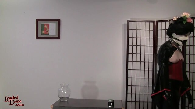 The latex concubine performs the Japanese Tea Ceremony