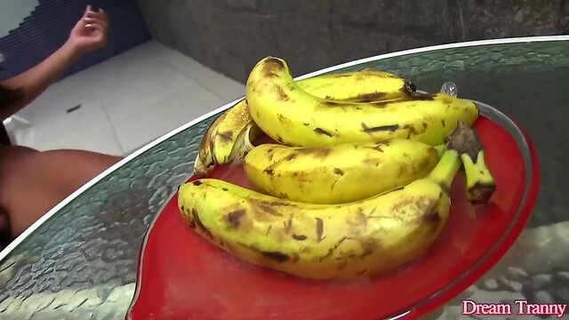 Shemale Erica Lee inserting a banana