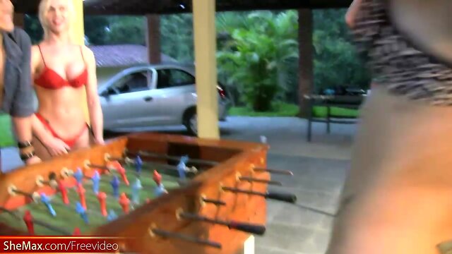 T-girls strip down lingerie and stockings playing foosball