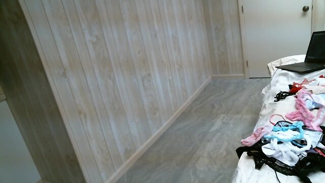 Crossdresser trying on different panties