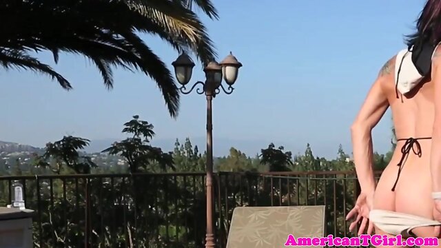 Busty transwoman jerks her cock outdoors