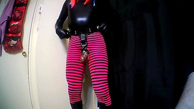 Sissys chastity belt, cage and big dildo