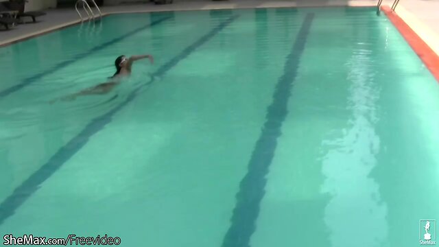 Amazing t-girl poses in bikini poolside and strips in shower