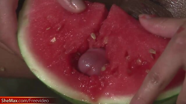 Big ass t-girl plunges her thick shecock into melon and tugs