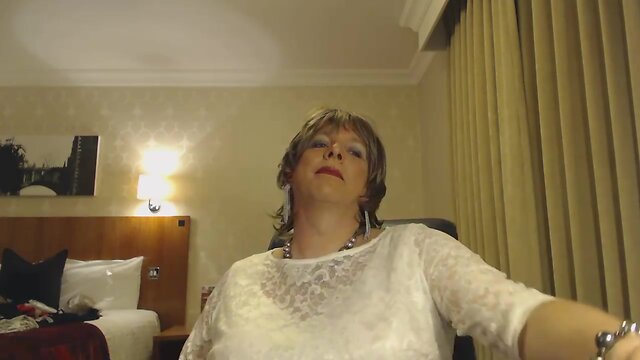 Seductive Babe in Lingerie, Stockings, and Pantyhose Pleasures Herself