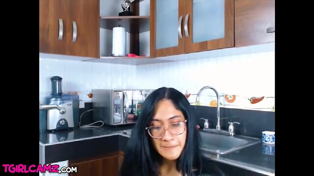 Shemale monstercock wobbling in skirt on Web Cam