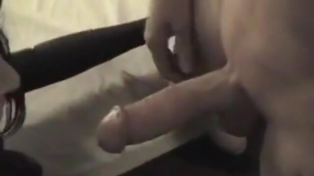 Crossdresser gets two cocks